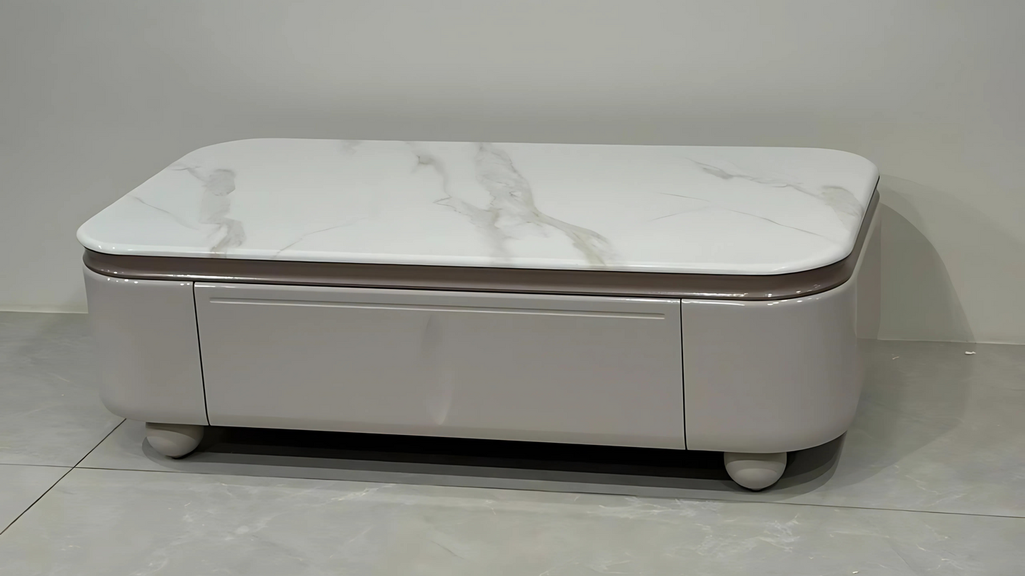 Oval pearl blush lacquer center table with white marble top and soft modern silhouette