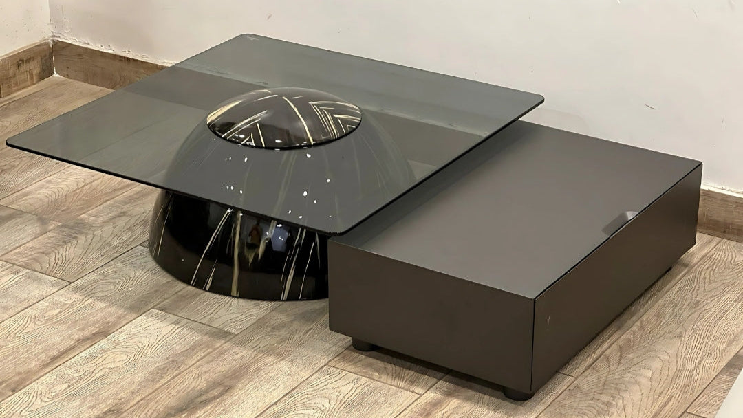 Luxury center coffee table with smoked glass, black marble dome base, and graphite extension block