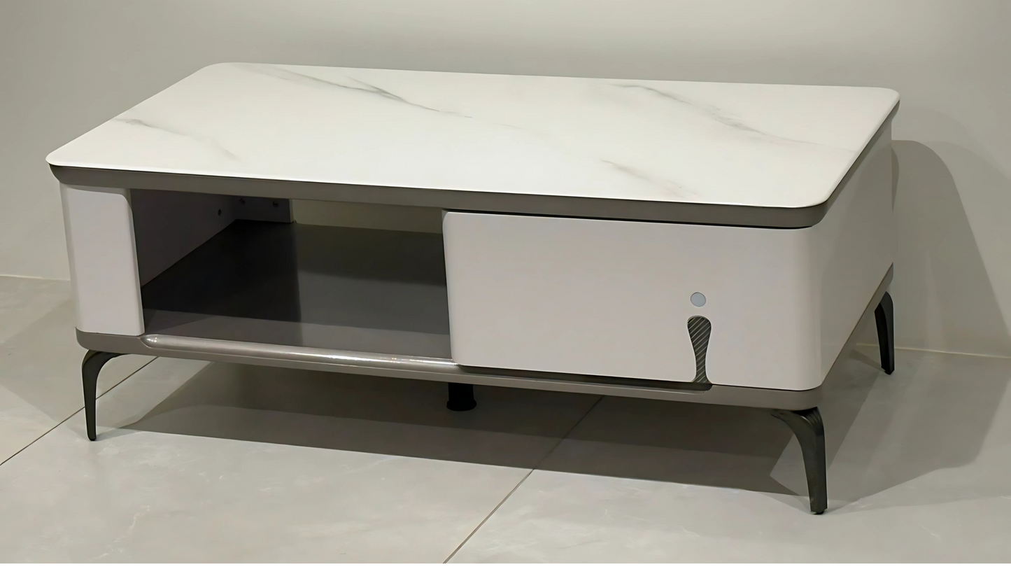 White modern center table with marble-look top, drawer, and open shelf on metal legs