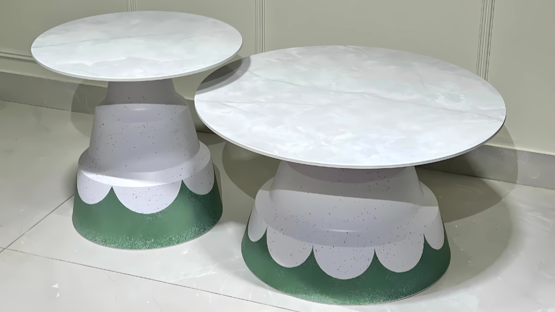 Pair of round marble-top center tables with scalloped green artistic bases