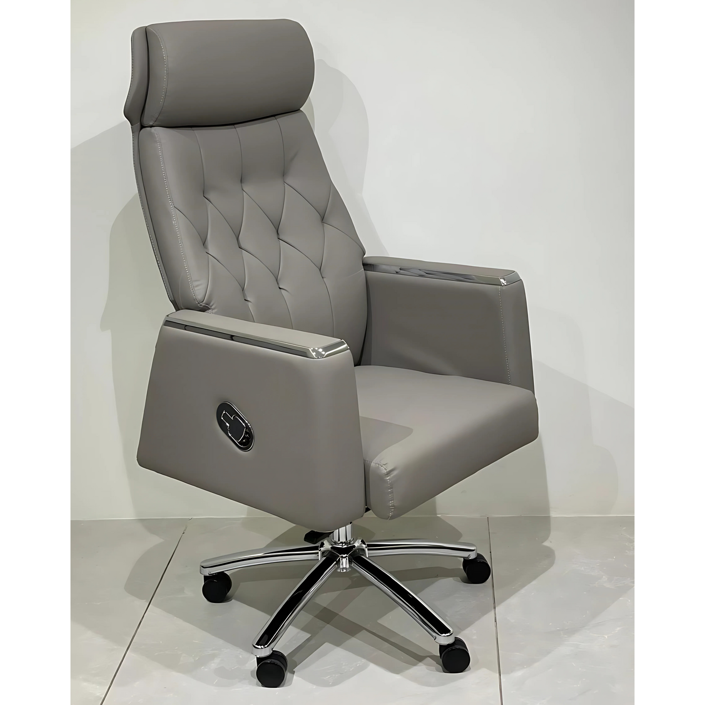 A gray upholstered office chair with a high back, armrests, and a five-point chrome base with caster wheels.