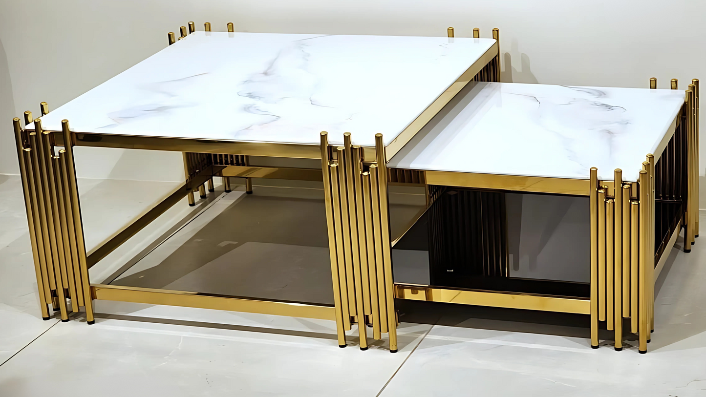 Gold-framed square marble center tables with vertical rod detailing by TAS Living