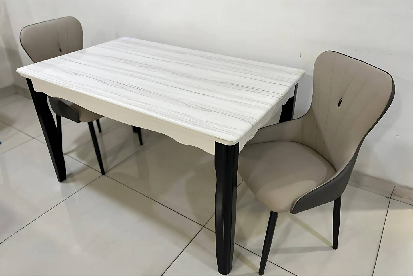 Luxury dining table set with white marble-finish top and taupe designer armchairs by TAS Living