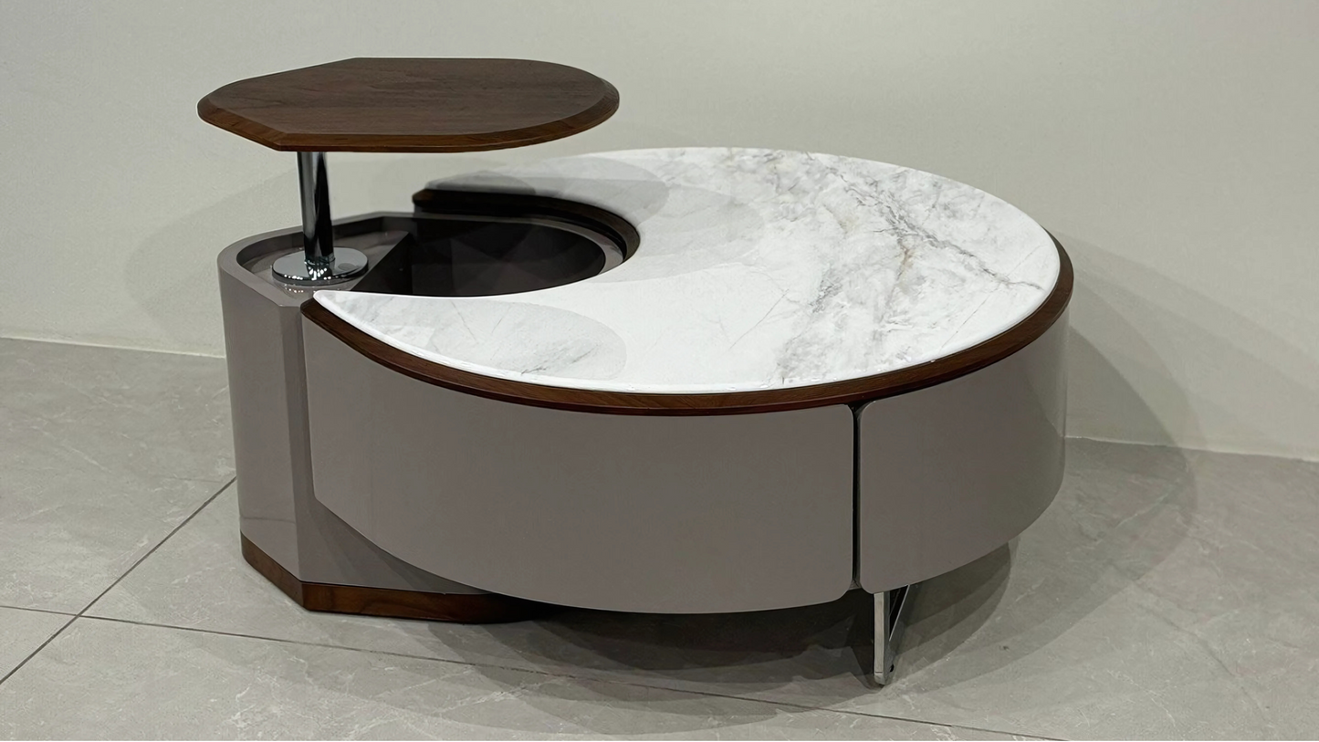Modern round center table with marble top, walnut trim, and crescent lift tray