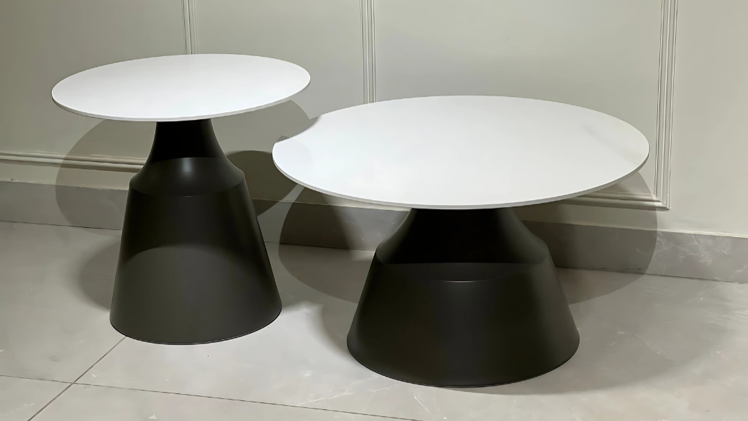 Noir Blanc monochrome center coffee table set with sculptural black base.