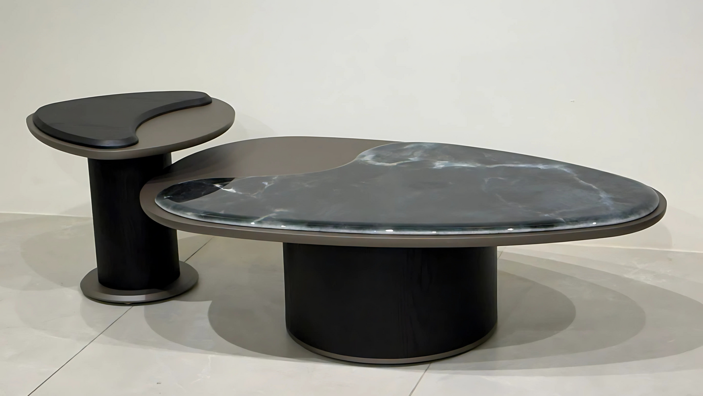 Sculptural black marble center coffee table set with yin-yang form and cylindrical base – TAS Living