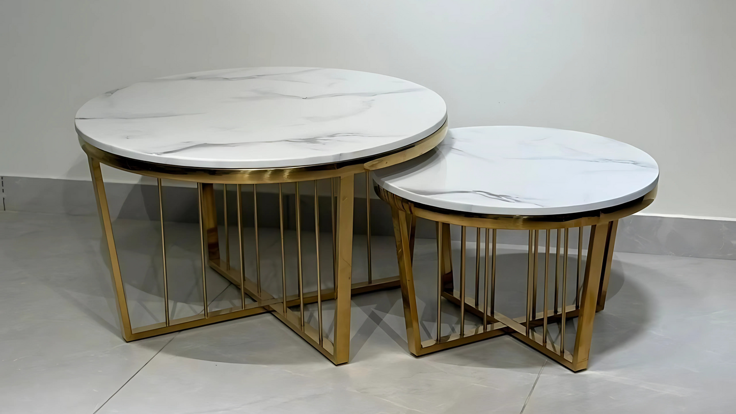 White marble round nesting center tables with gold cross base — TAS Living