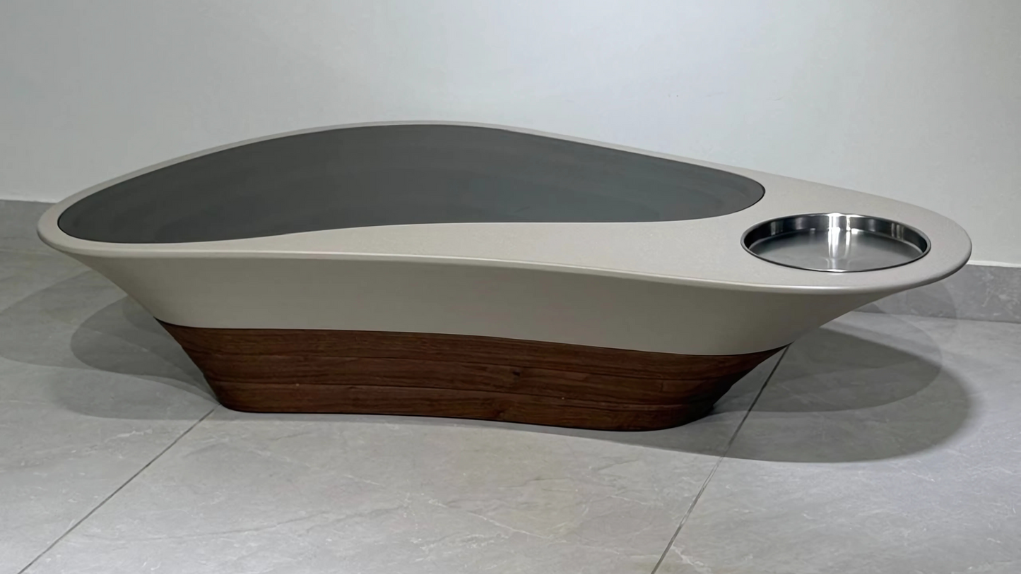 Asymmetrical beige and wood modern center table with inset stainless tray