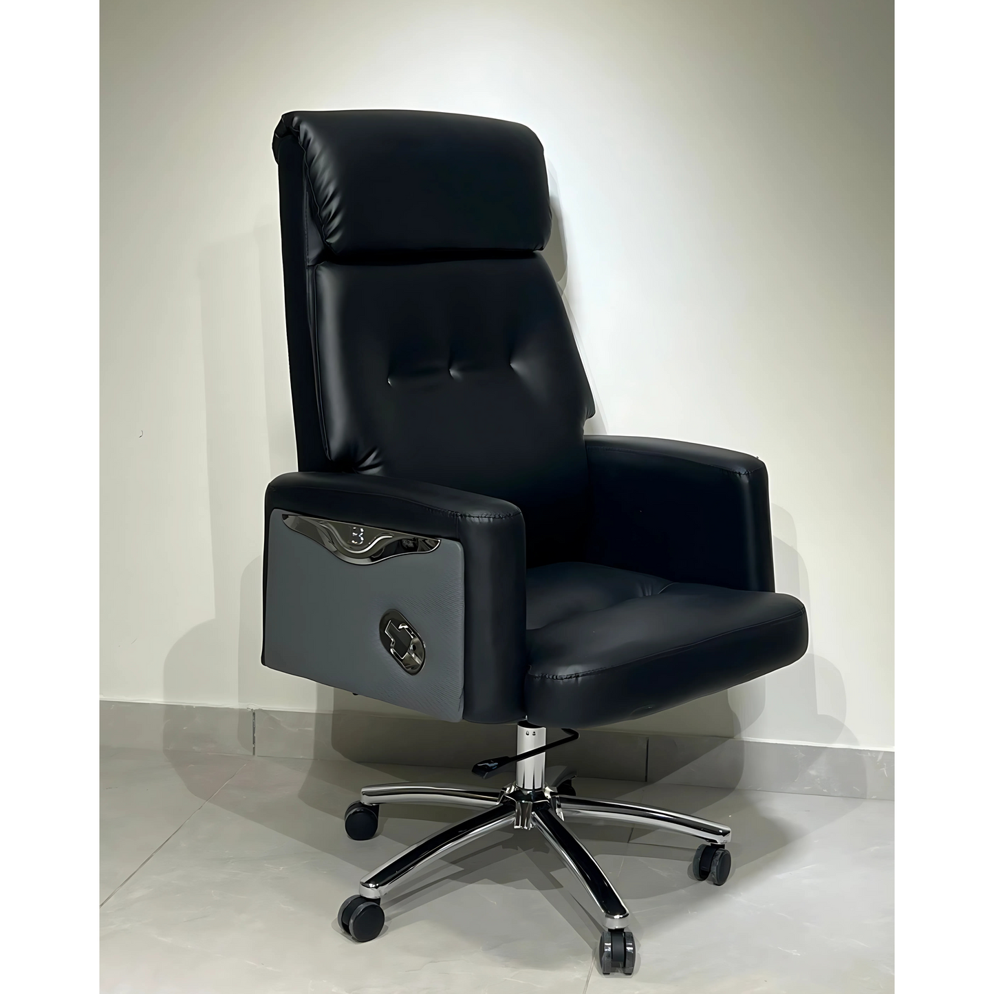 A black office chair with a high back, armrests, and a five-point wheeled base.
