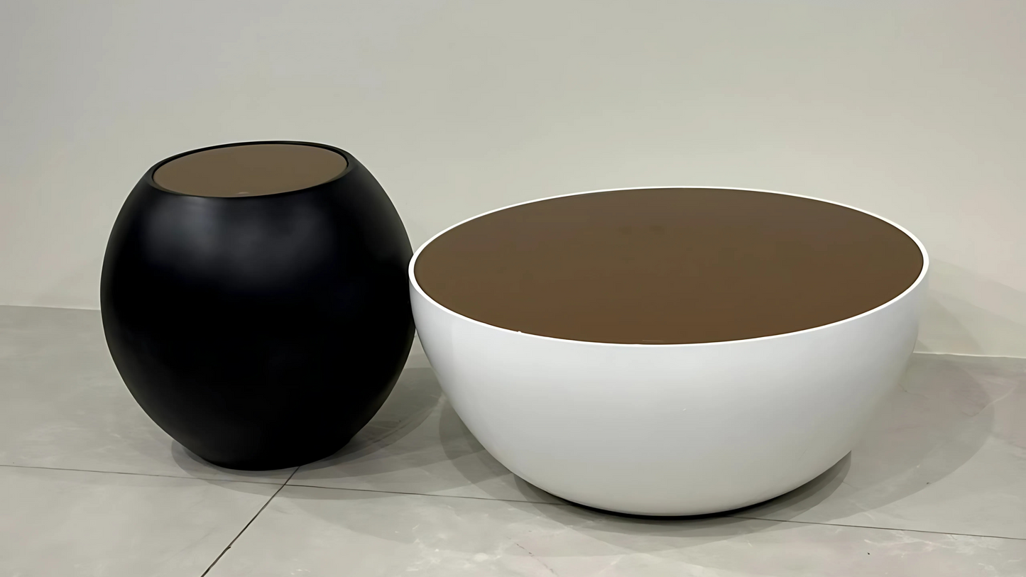luxury marble center table with dark base and metallic detailing in Art Deco style