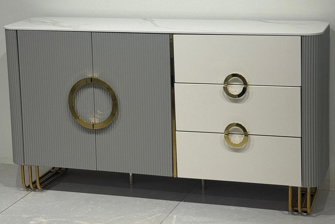 Modern sideboard with marble top and gold accents on a gray background