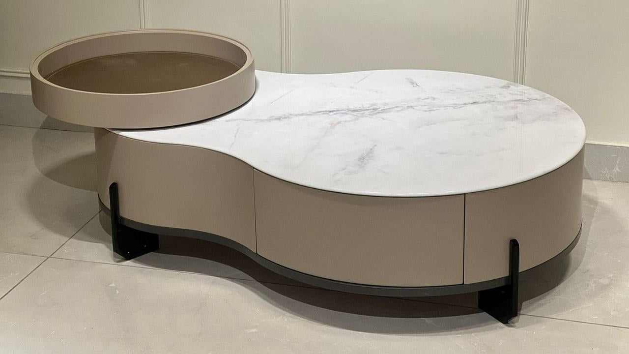 Modern marble coffee table with organic form and integrated tray — TAS Living