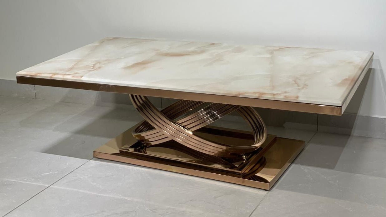 Luxury rose gold center table with creamy onyx marble top and sculptural base