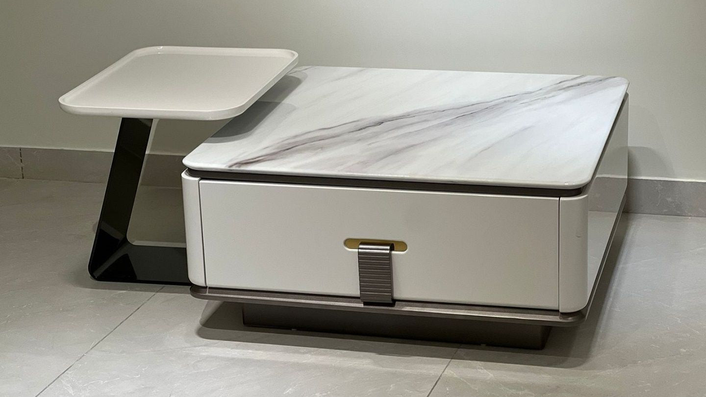 White marble coffee table with storage and modern cantilever side table — TAS Living