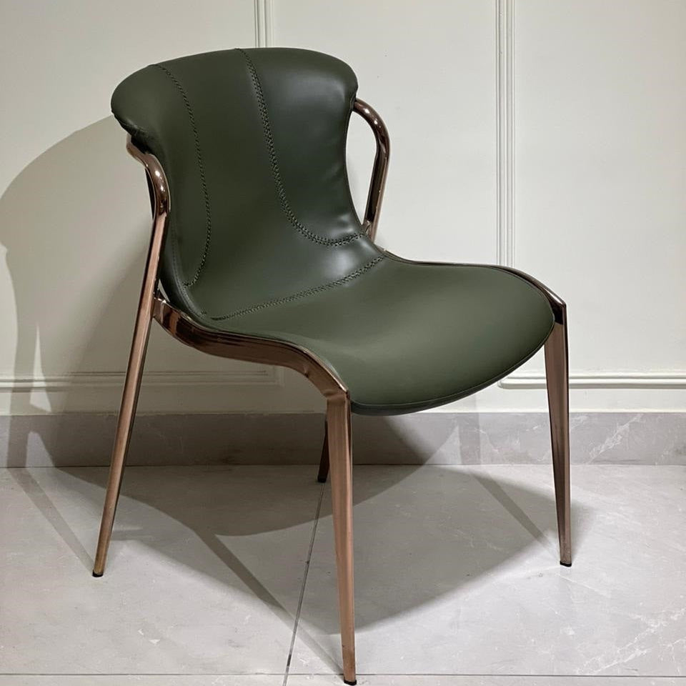 Green designer chair with rose-gold legs