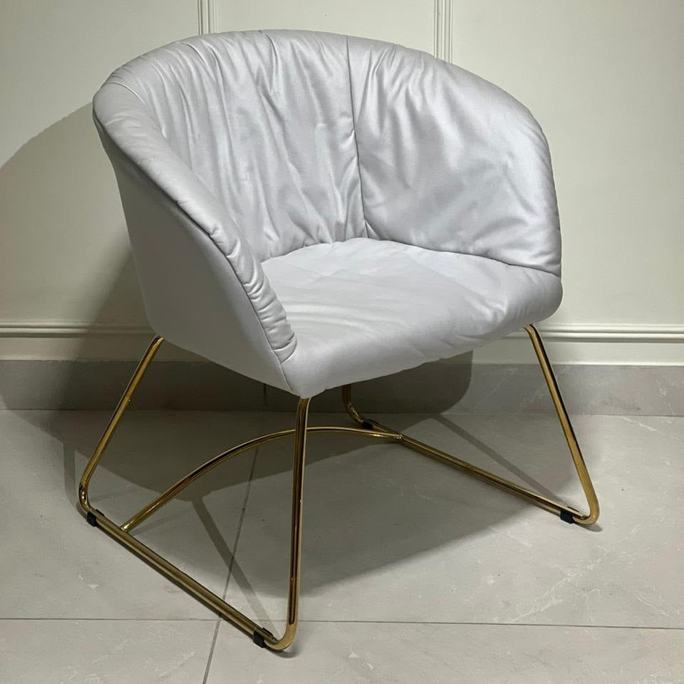 Modern accent chair in soft grey upholstery
