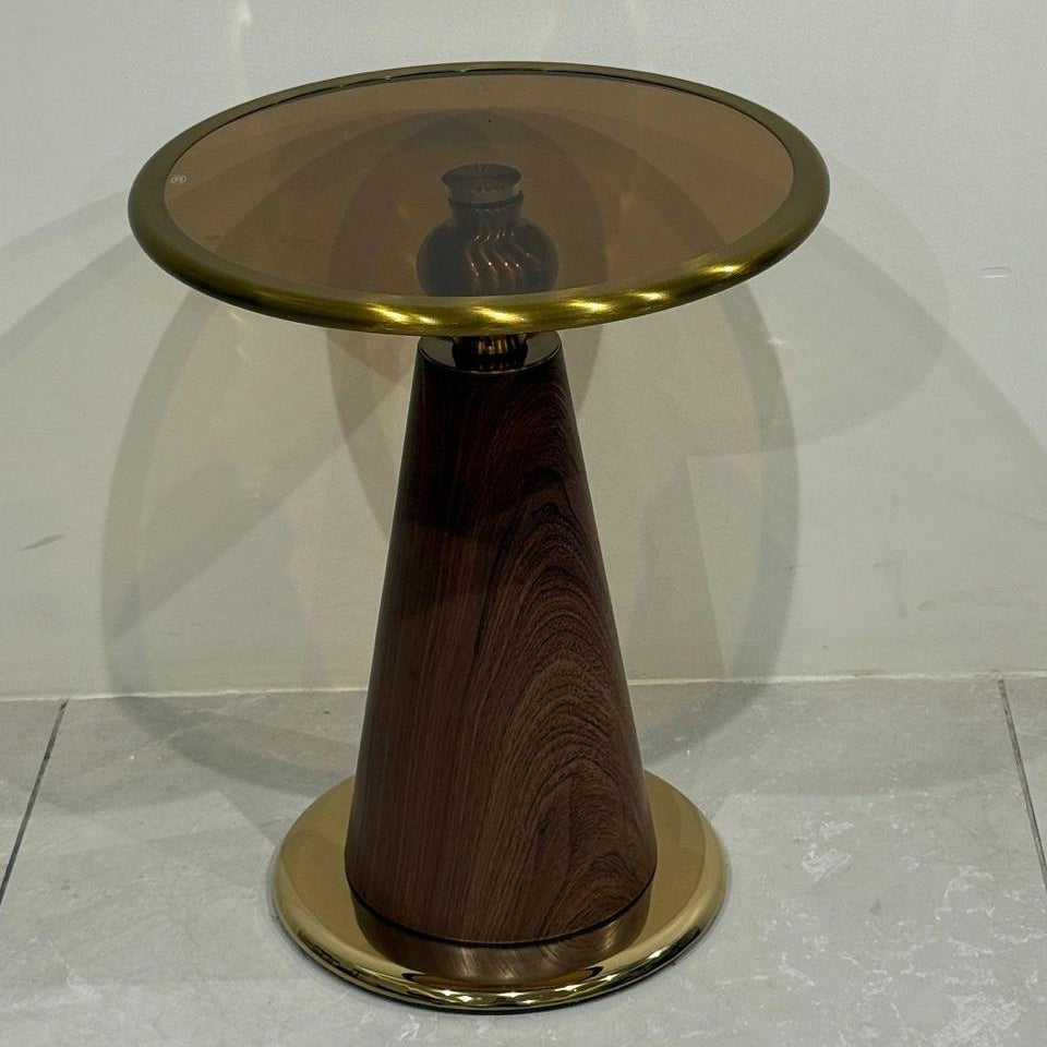 Side table with gold and wood finish on a white background