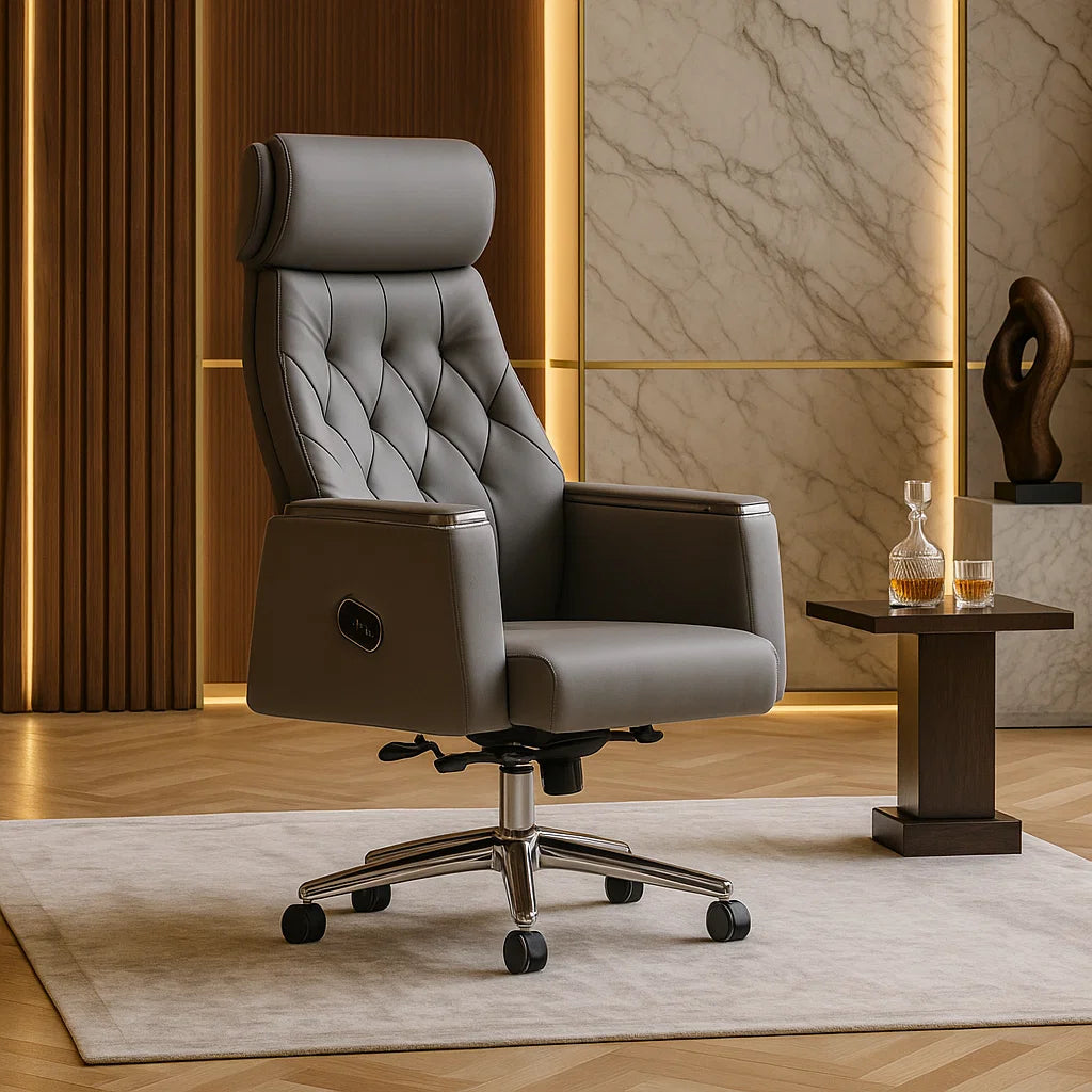 Gray leather office chair in a luxurious room with marble walls and a small table.