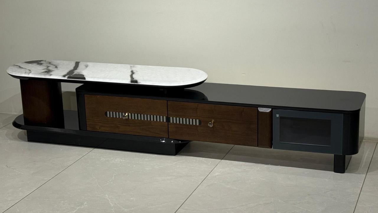Wooden TV stand with marble top on a tiled floor, labeled 'LCD RUNNER TV-H55'.