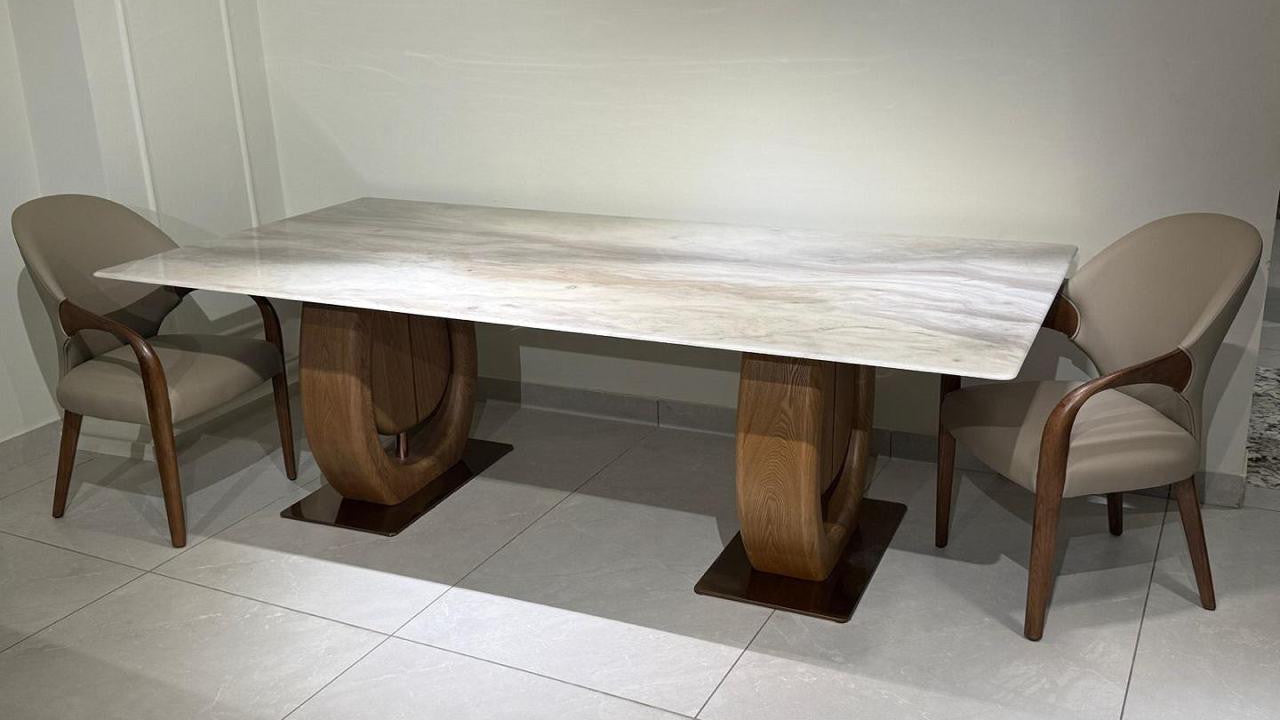 Dining table with four chairs in a room setting