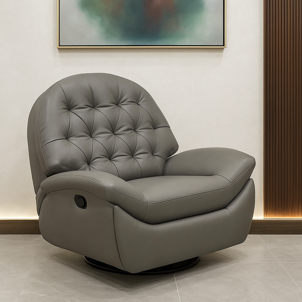 Gray tufted armchair in a room with abstract art on the wall.