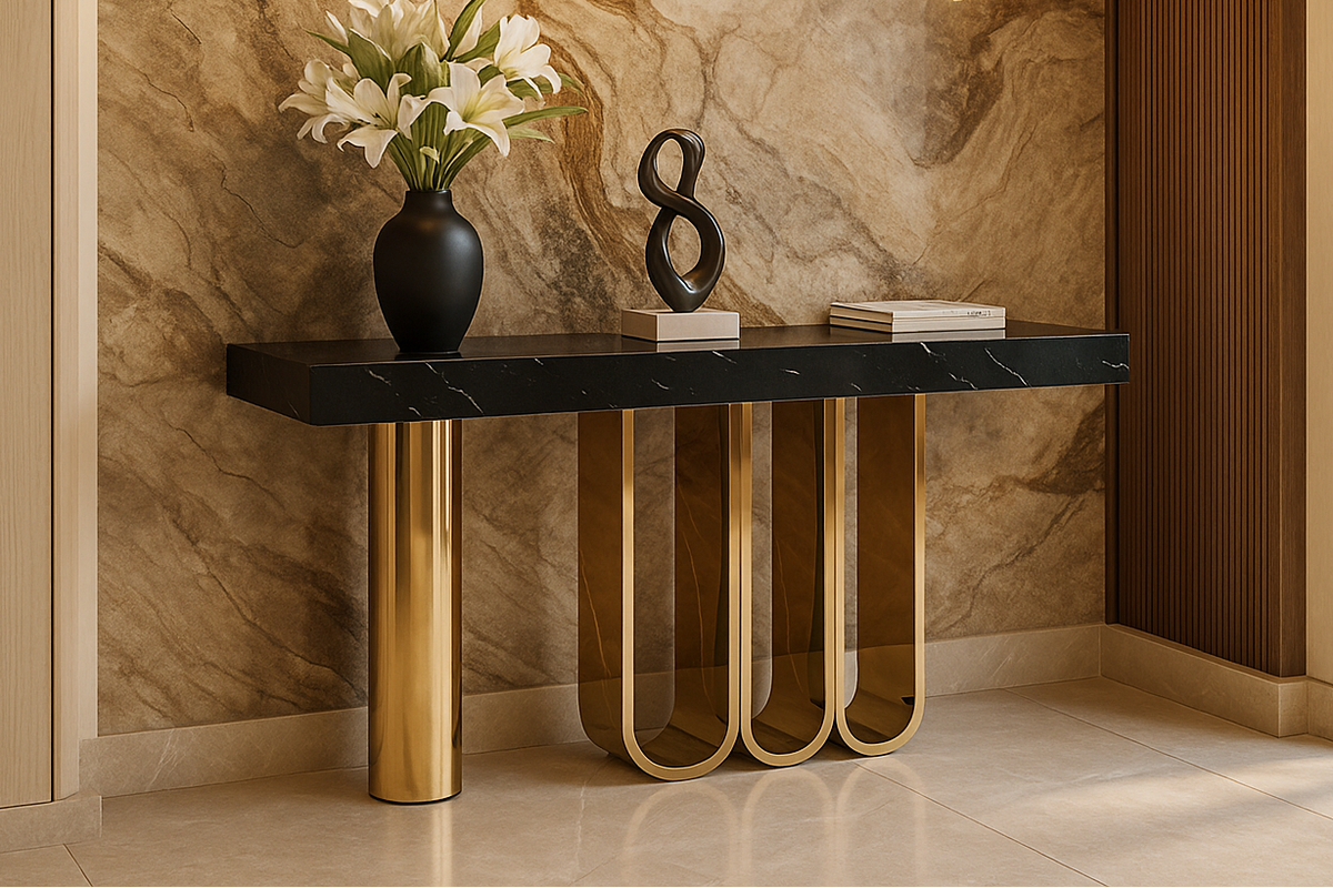 Modern console table with decorative items against a marble wall.