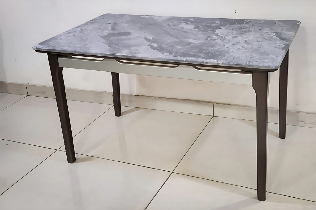 Small grey marble dining table with black legs in modern minimalist style