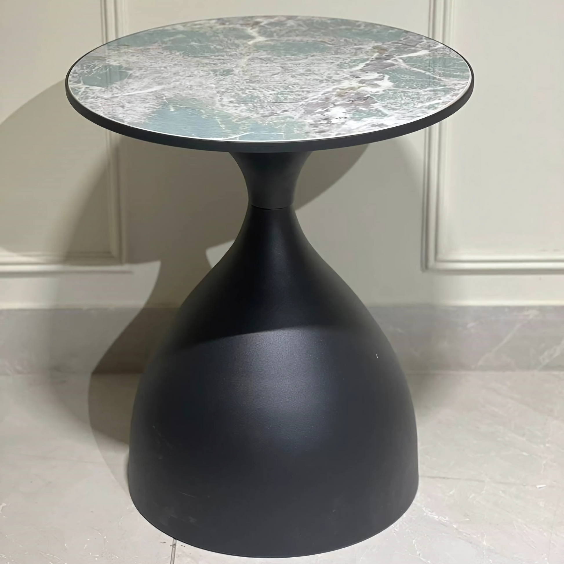 Black pedestal table