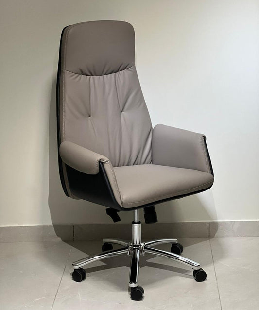 High-back grey and black revolving executive office chair with chrome base