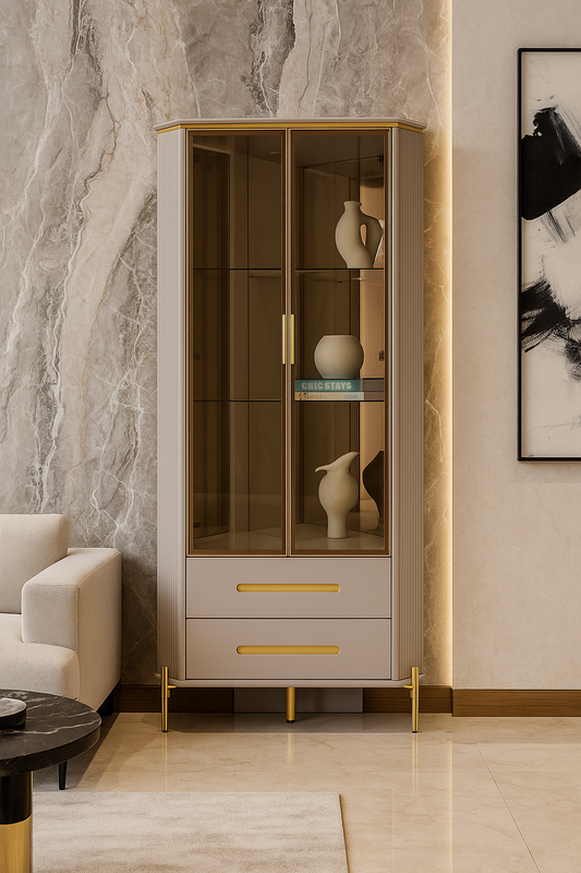 Modern cabinet with glass doors and gold accents in a stylish room.