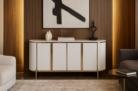 Modern white sideboard with gold accents in a stylish living room setting.