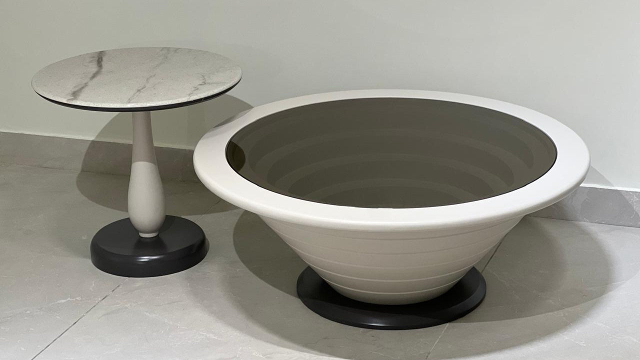 Sculptural dome-shaped coffee table with marble pedestal side table — TAS Living