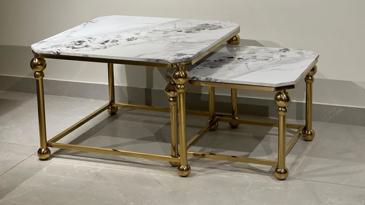 Luxury marble coffee table set with golden frame and spherical corner details — TAS Living