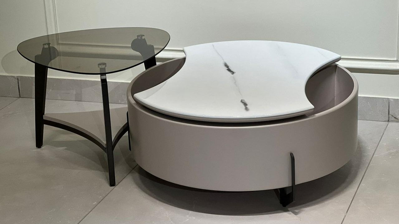 Luxury dual-piece coffee table set with white marble crescent top, taupe base, and smoky glass side table — TAS Living