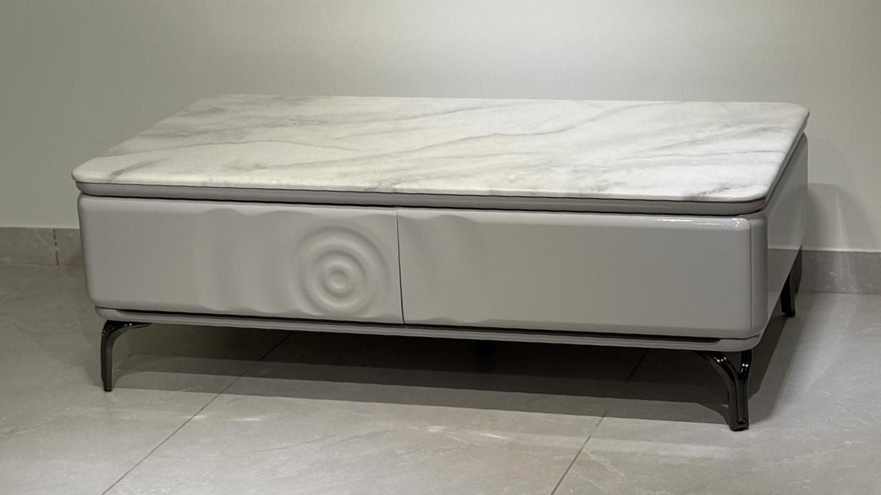 Modern marble storage center coffee table in white with minimalist design – TAS Living.
