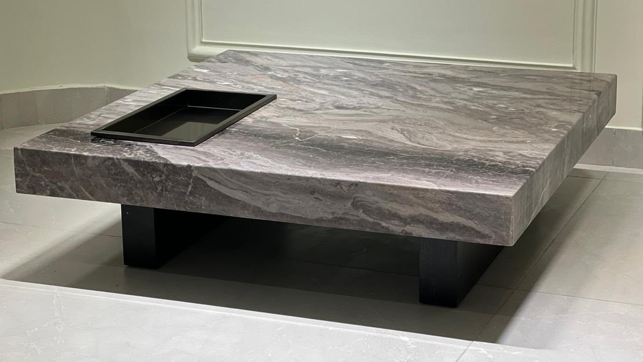 Luxury grey marble square coffee table with matte black base by TAS Living.