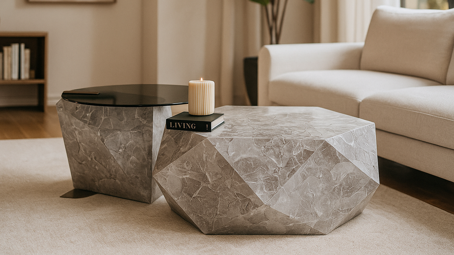 Designer faceted marble coffee table set with glass top for luxury interiors.

