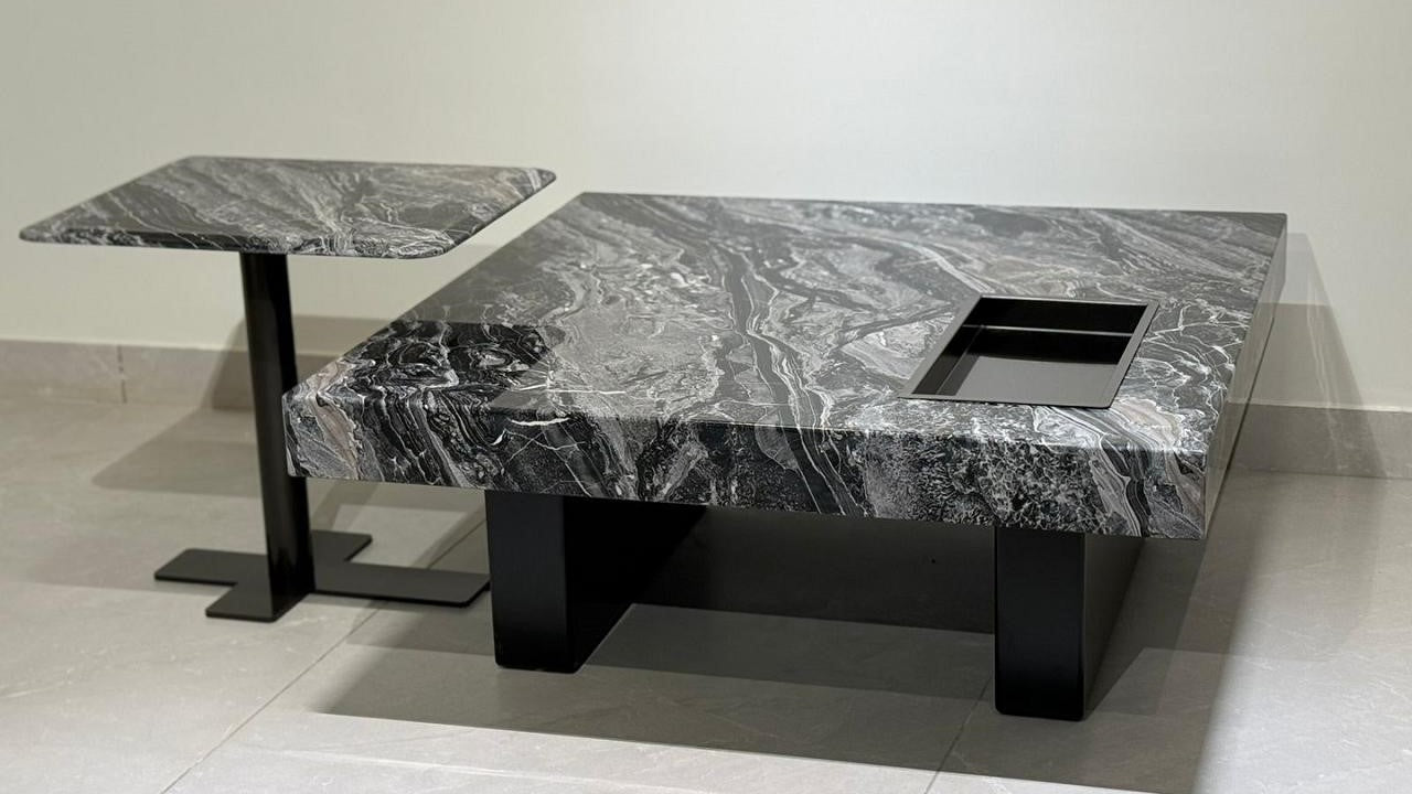 "Luxury black marble center table set with matching side table – modern living room design."
