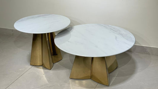 Round white marble center coffee tables with gold petal base in dual sizes, luxury pairing from TAS Living

