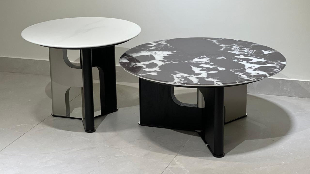 Black and white marble coffee table set with sculptural matte bases — TAS Living