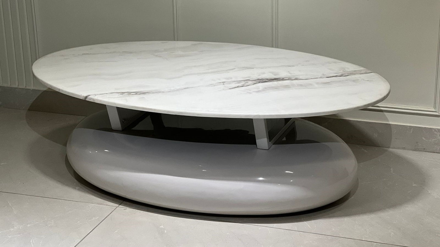 "Luxury oval white marble coffee table with sleek glossy base for modern interiors.
"