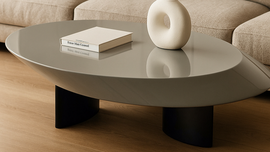 Gray designer modern center table with geometric sculptural form

