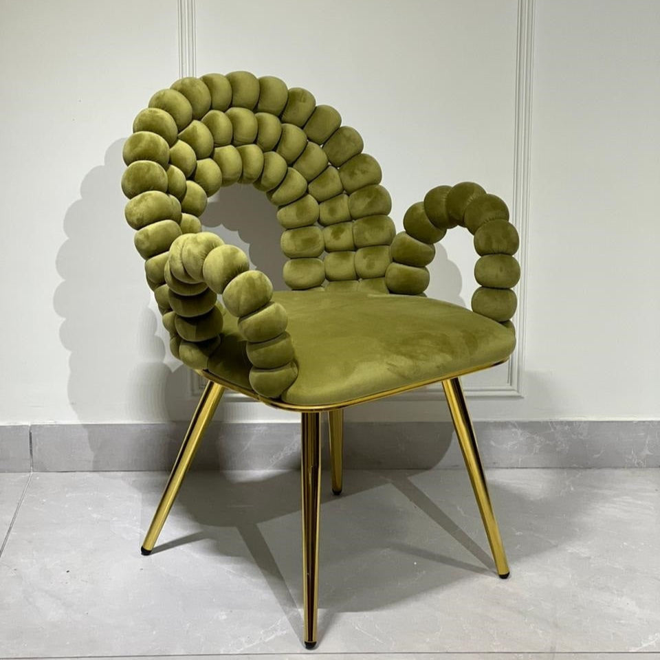 Luxury green velvet accent chair with sculptural bubble backrest and gold legs