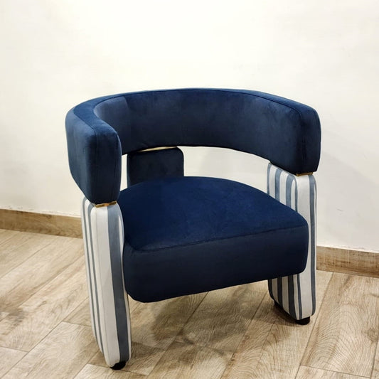 Blue velvet accent chair with striped legs in grey and white