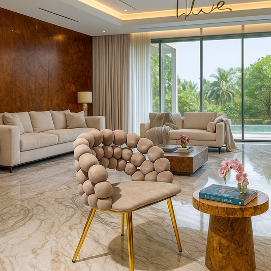 Beige velvet accent chair with spherical backrest and gold legs