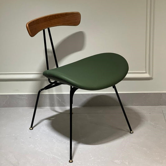 Modern industrial chair with curved seat and minimalist frame