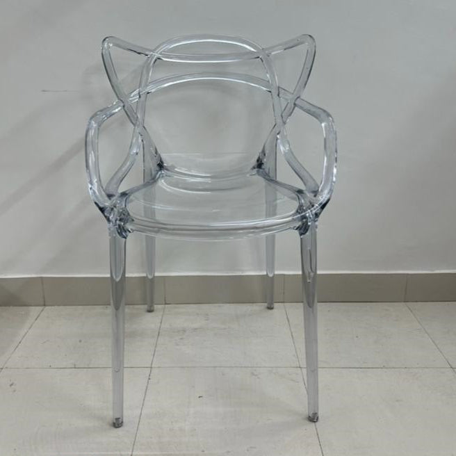 Transparent acrylic chair with sculptural backrest