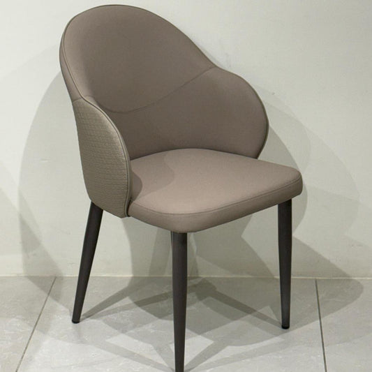 Luxury beige chair with ergonomic design and tapered legs