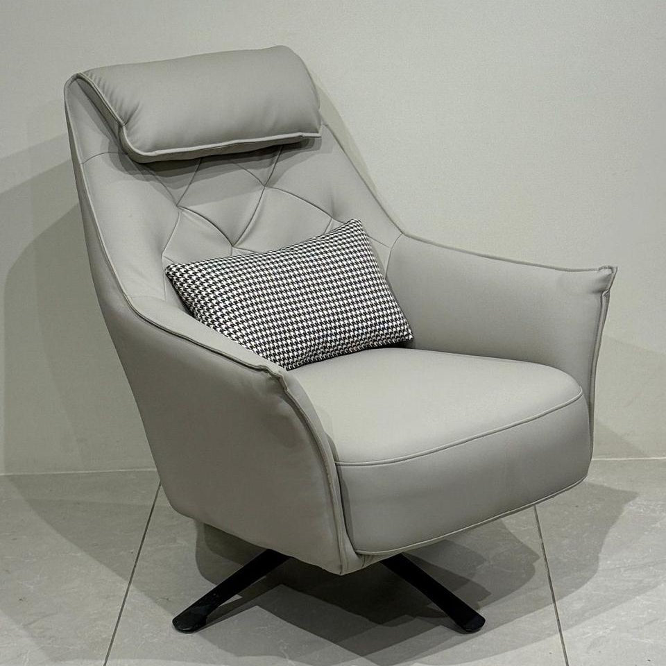Light gray leisure chair with a pillow on a white background