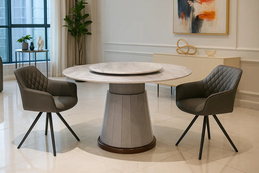 Round dining table with two chairs in a modern interior setting